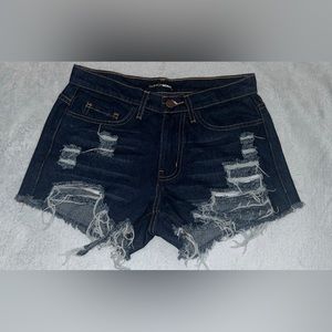Medium size ripped jeans shorts.